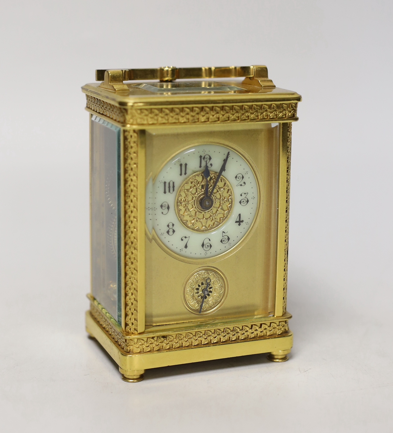 An Edwardian brass carriage timepiece with alarm, 12cm